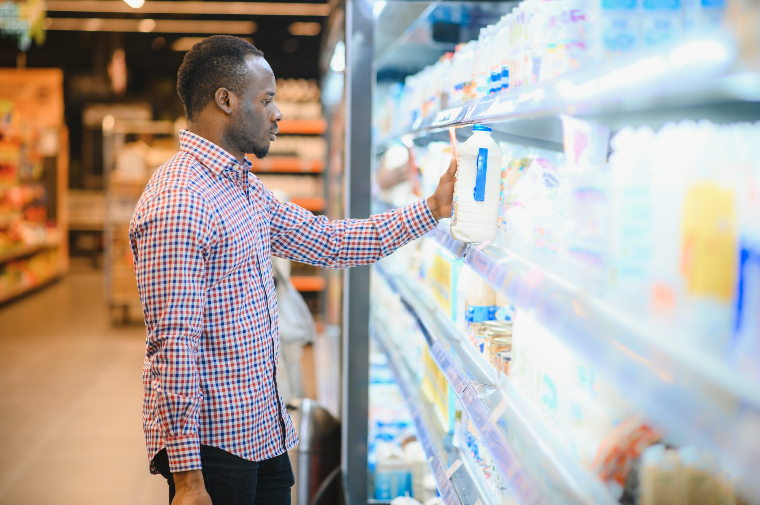 smiling man at a grocery store